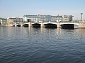 Сампсониевский мост через реку Большая Невка, рядом с мостом расположен легендарный крейсер Аврора и Нахимовское училище